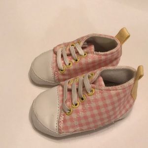 Pink and white checkered canvas shoes
